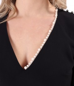 Elegant dress with pearls at the neckline