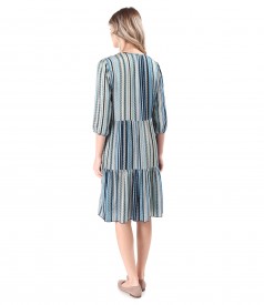 Dress with ruffles made of viscose printed with geometric motifs