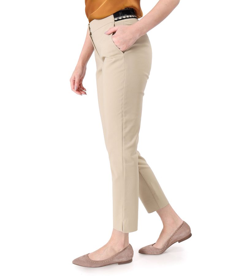 Elastic cotton pants with front pockets