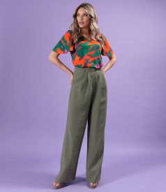 Elegant elastic jersey blouse with wide sleeves