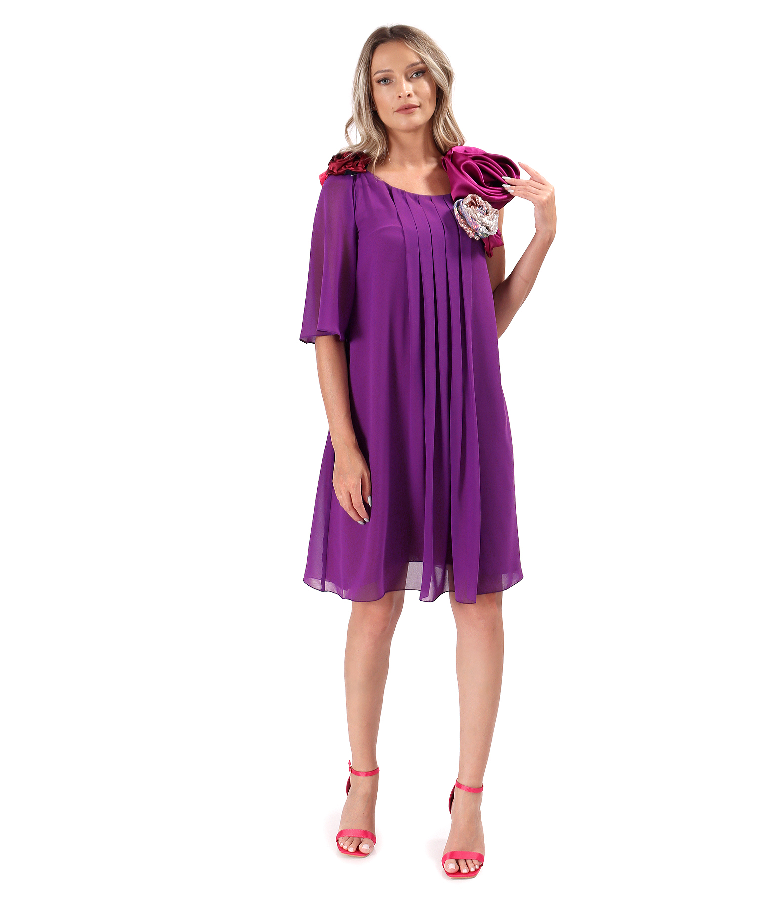 Elegant dress made of voile with satin flowers at the neckline