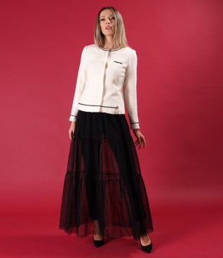 Elegant outfit with long tulle skirt, jacket and ankle pants