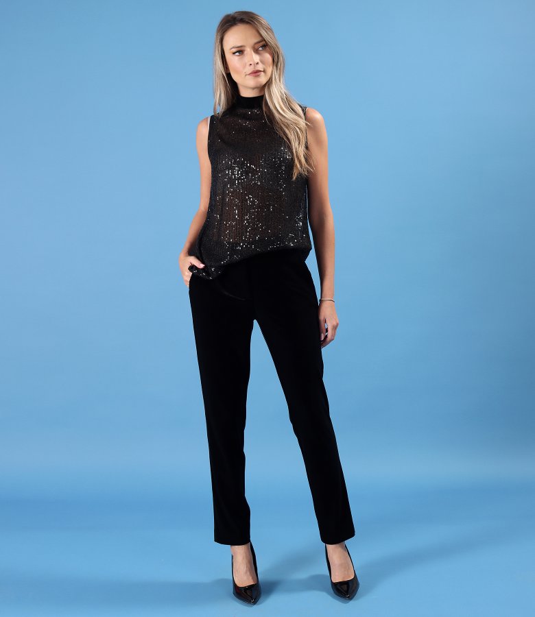 Black elastic velvet pants with elastic band at the waist