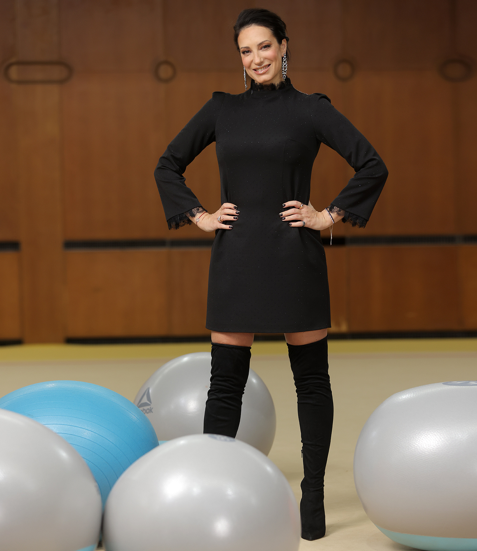 Short cocktail dress made of fabric with shiny applications