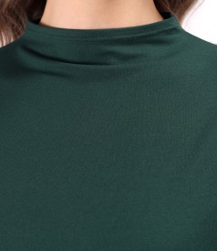 Elastic jersey blouse with neckline on the neck