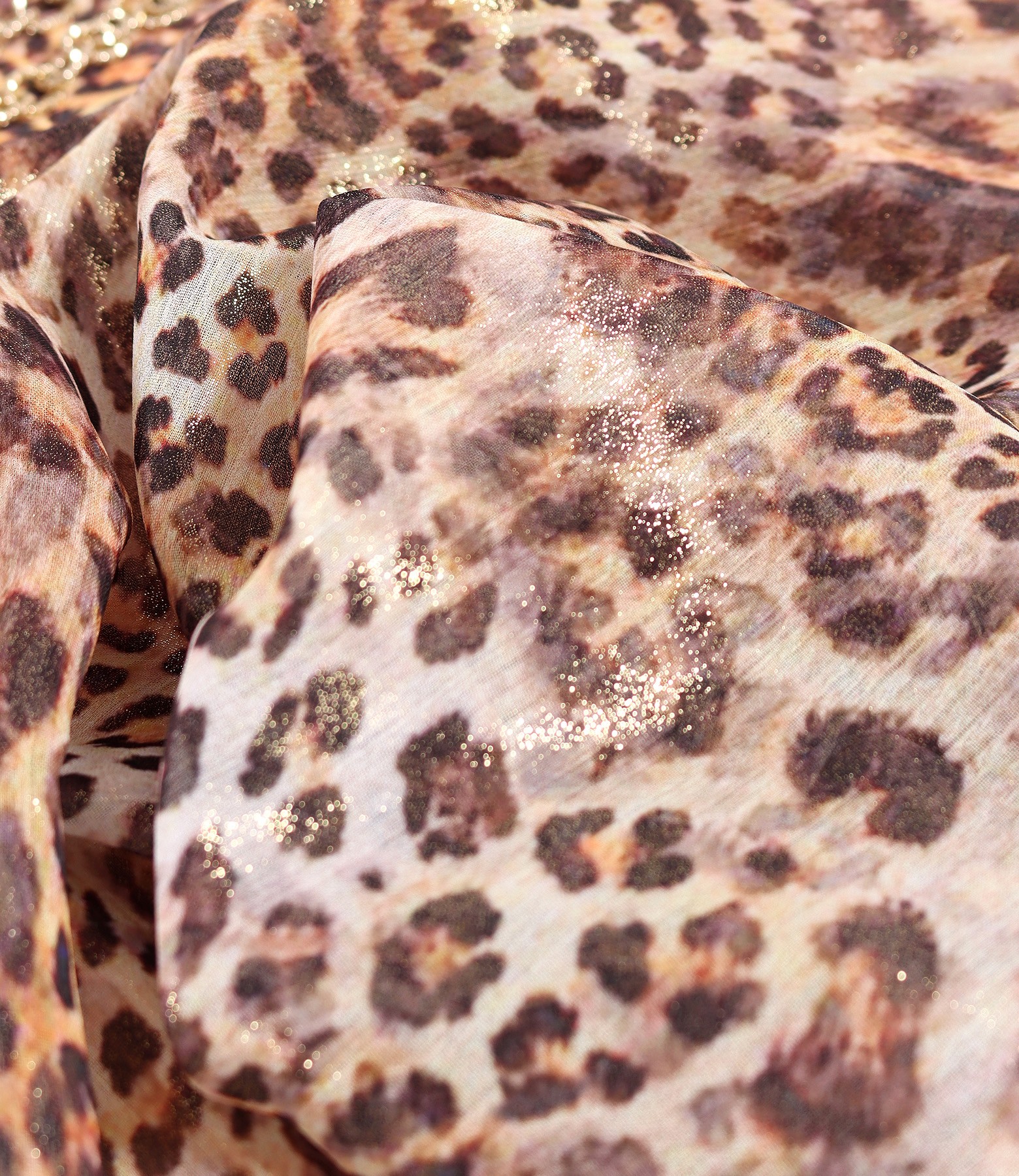 Blouse with folds at the neckline made of animal-printed veil and lurex thread