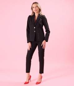 Elastic cotton pants with a decorative elastic band.