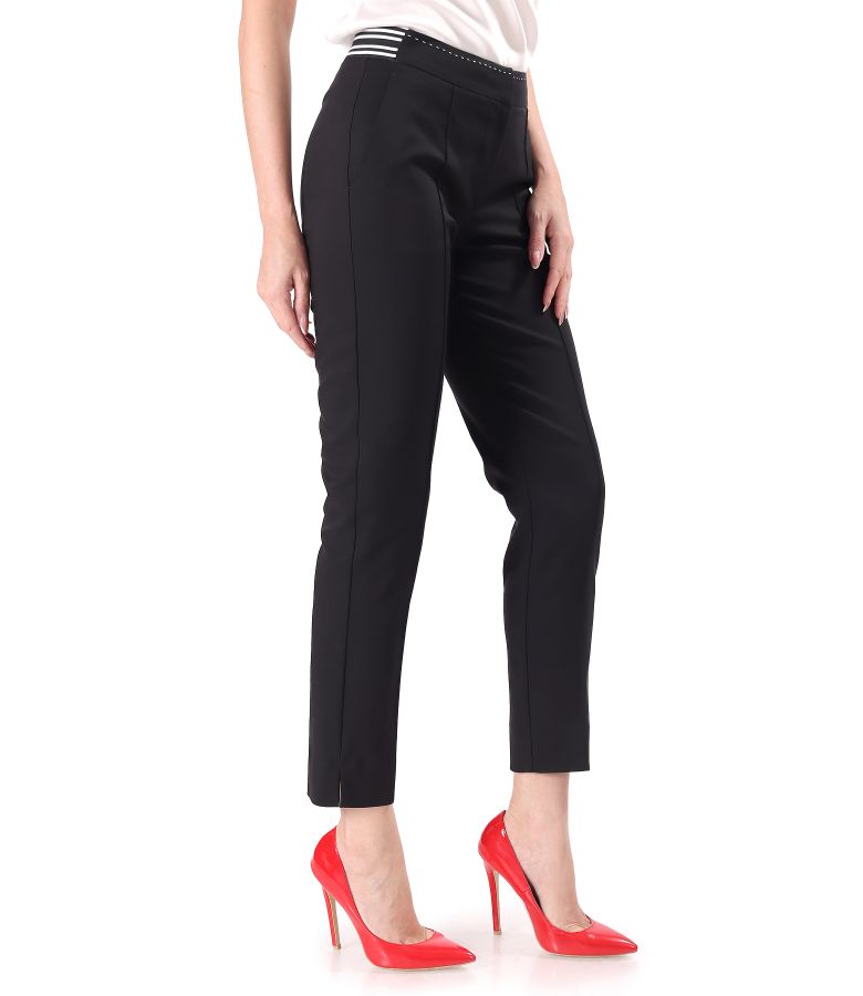 Elastic cotton pants with a decorative elastic band.