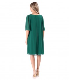 Elegant dress made of veil with flared sleeves