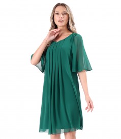 Elegant dress made of veil with flared sleeves