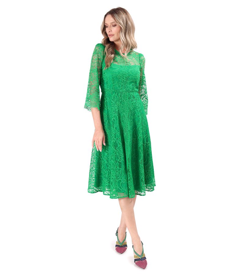 Elegant dress made of lace with floral motifs