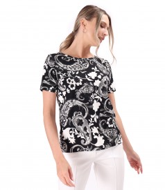 Elastic jersey blouse printed with floral motifs