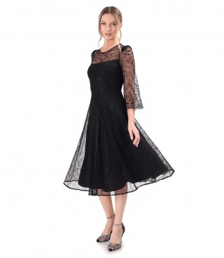 Elegant dress made of lace with floral motifs