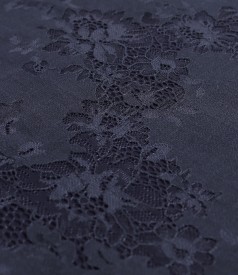 Elegant cotton lace dress with floral motifs