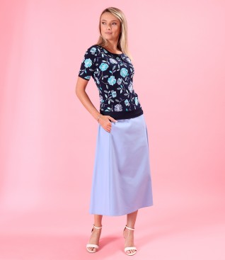 Elegant outfit with skirt and blouse made of embossed elastic jersey