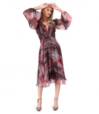 Elegant dress made of printed veil with golden motifs