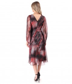 Elegant dress made of printed veil with golden motifs