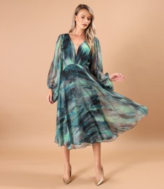 Elegant dress made of printed veil with golden motifs
