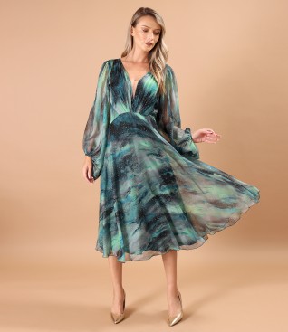 Elegant dress made of printed veil with golden motifs