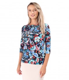 Elastic jersey blouse printed with floral motifs