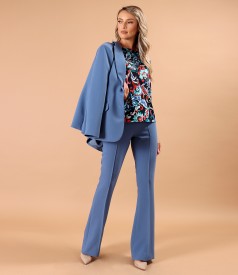 Elastic jersey blouse printed with floral motifs