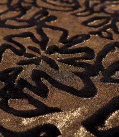 Bolero made of elastic velvet printed with golden motifs
