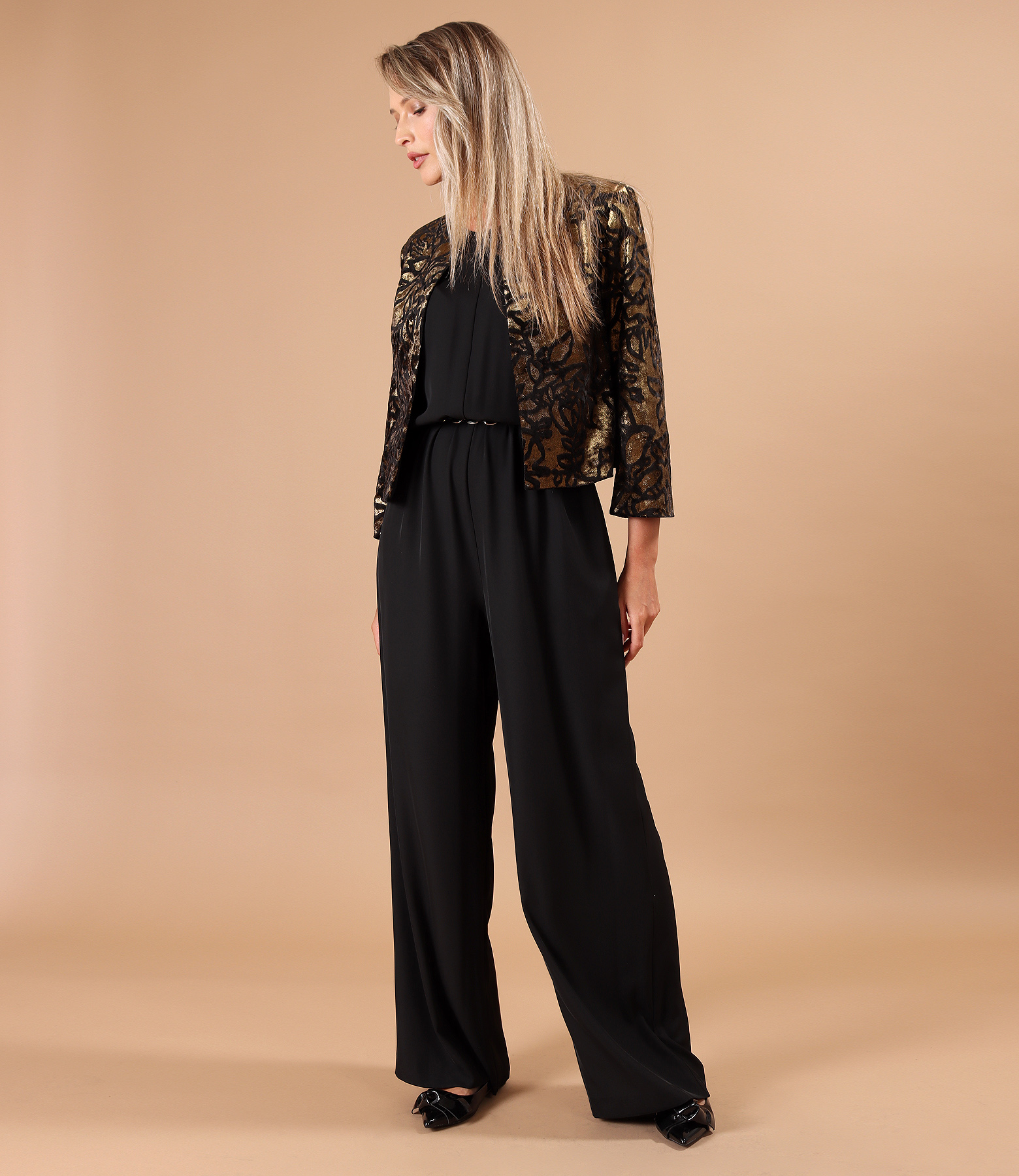 Evening set with velvet bolero in a gold motif print and full-length jumpsuit