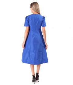 Flared taffeta dress with flower at the waist
