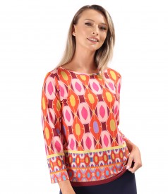 Elastic jersey blouse printed with geometric motifs