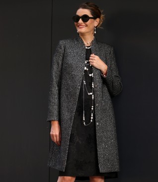 Elegant coat made of fabric with sequins