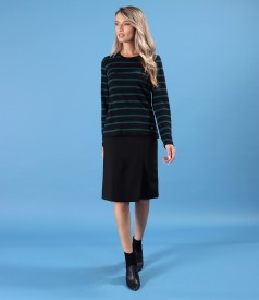 Elegant outfit featuring a flared skirt and blouse made of jersey and wool
