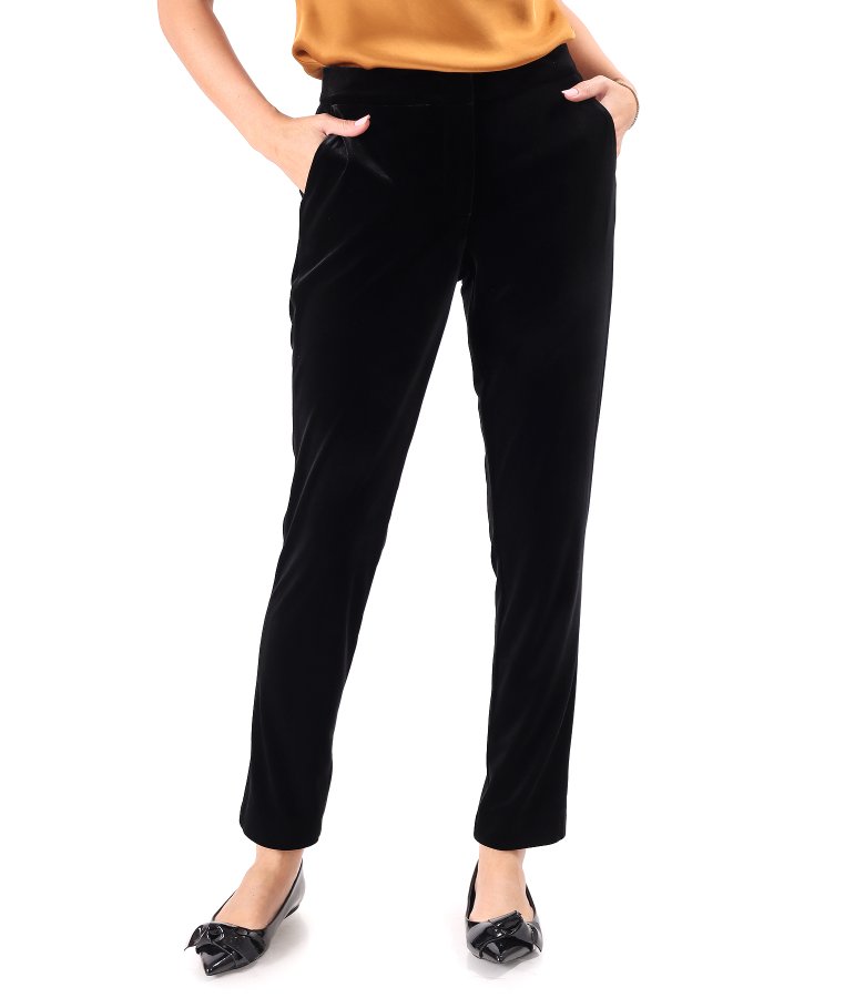 Black elastic velvet ankle pants with an elastic waistband