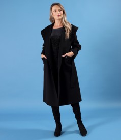 Dress made of elastic velvet with glitter and an overcoat made of wool with cashmere