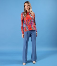Elegant outfit with long-sleeved blouse and flared pants