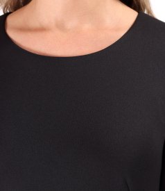 Dress made of elastic fabric decorated with crystals at the waist