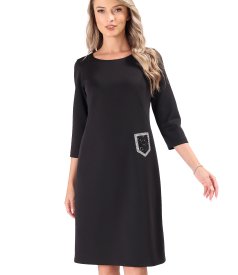 Dress made of elastic fabric decorated with crystals at the waist