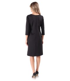 Dress made of elastic fabric decorated with crystals at the waist