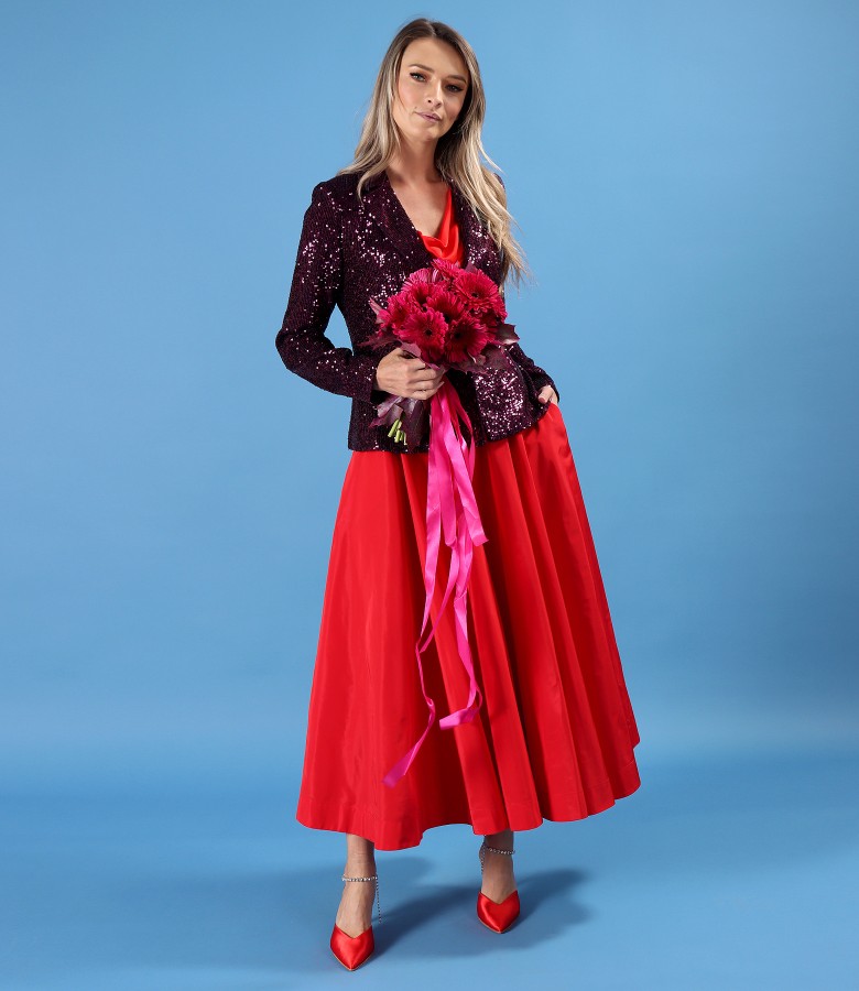 Evening outfit with long taffeta skirt and sequin jacket
