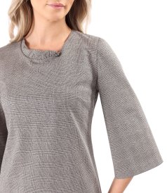 Elegant dress made of checked fabric with gold metallic thread