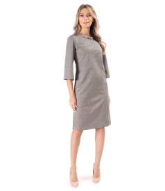 Elegant dress made of checked fabric with gold metallic thread