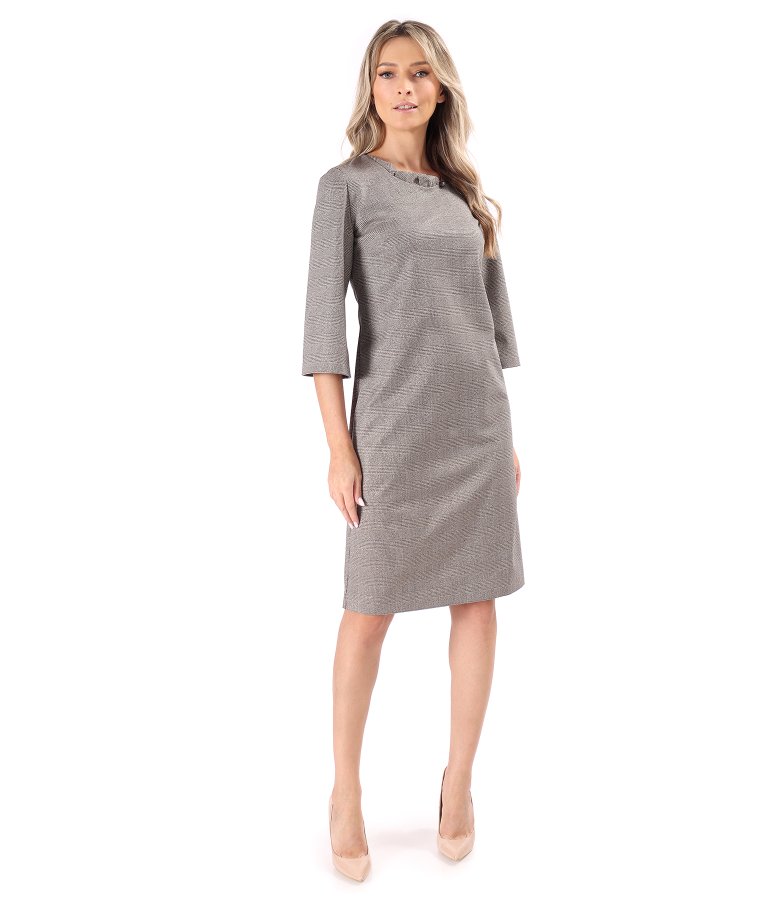 Elegant dress made of checked fabric with gold metallic thread