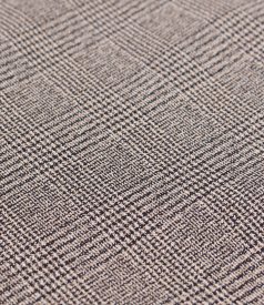 Elegant dress made of checked fabric with gold metallic thread