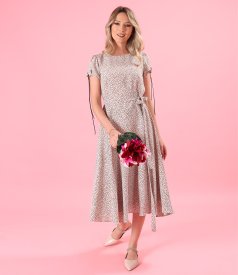 Elegant viscose dress printed with polka dots