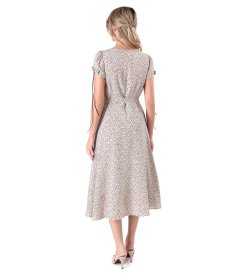 Elegant viscose dress printed with polka dots