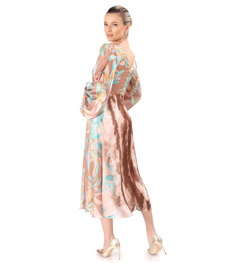 Evening dress in printed chiffon with floral motifs