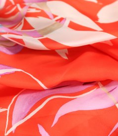 Long evening dress made of veil printed with floral motifs