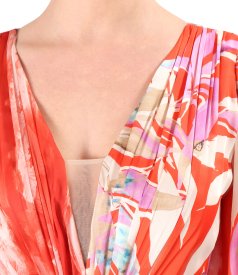 Long evening dress made of veil printed with floral motifs