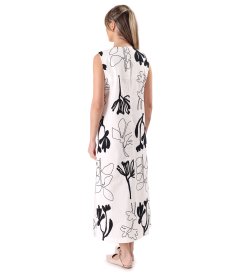 Long dress in embroidered cotton with floral motifs