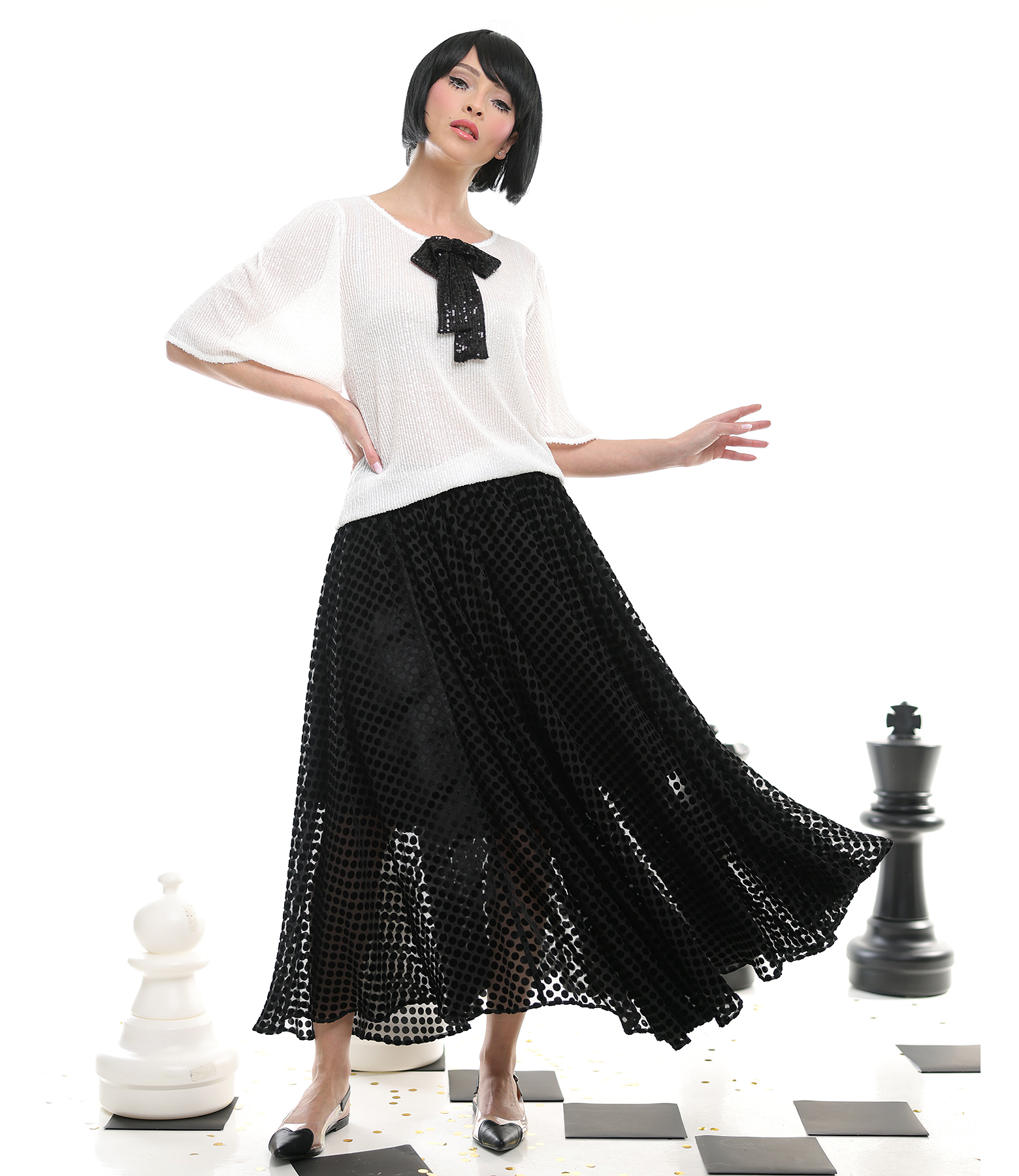 Loose blouse with short flared sequin sleeves