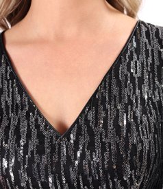 Long cocktail dress with voluminous sleeves and a sequin bodice